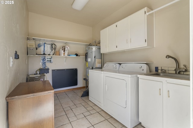 285 W Sunny Sands Rd, Cathlamet, WA 98612 - laundry area featuring separate washer and dryer, cabinet space, light tile patterned floors, and water heater