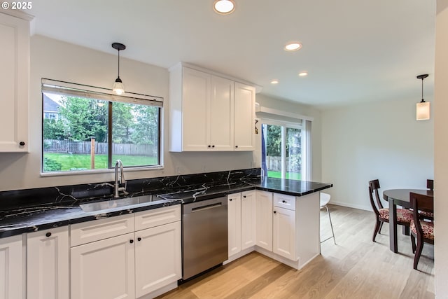 2900 NW 111th Ct, Portland, OR 97229 - kitchen with stainless steel dishwasher, a peninsula, recessed lighting, white cabinets, and a sink
