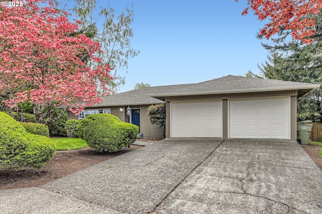 2900 NW 111th Ct, Portland, OR 97229 - view of front of home with a shingled roof, an attached garage, and driveway