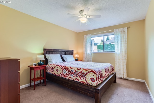 2900 NW 111th Ct, Portland, OR 97229 - bedroom with baseboards, carpet flooring, a textured ceiling, and ceiling fan