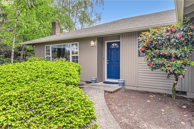 2900 NW 111th Ct, Portland, OR 97229 - doorway to property with a chimney