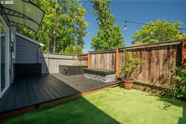 view of yard featuring a deck