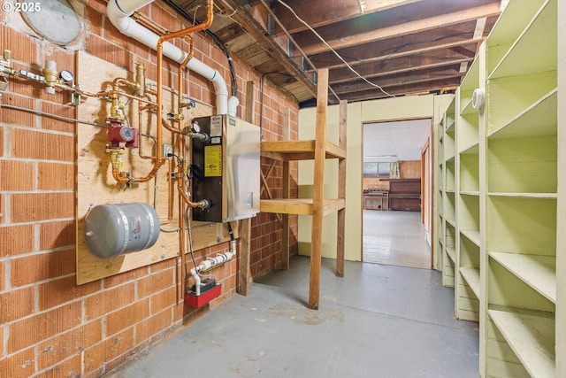 unfinished basement with water heater