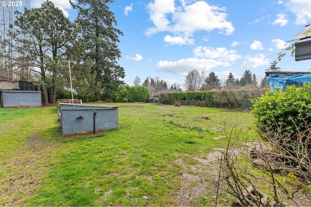 view of yard with fence