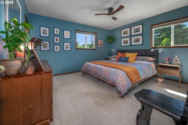 3511 NE Holman St, Portland, OR 97211 - carpeted bedroom with baseboards and ceiling fan