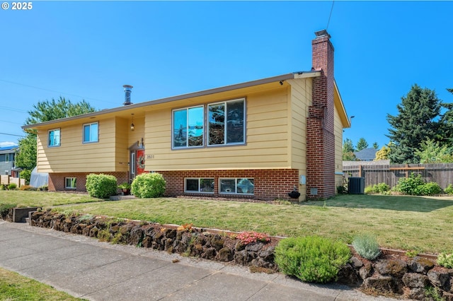 3511 NE Holman St, Portland, OR 97211 - bi-level home with a chimney