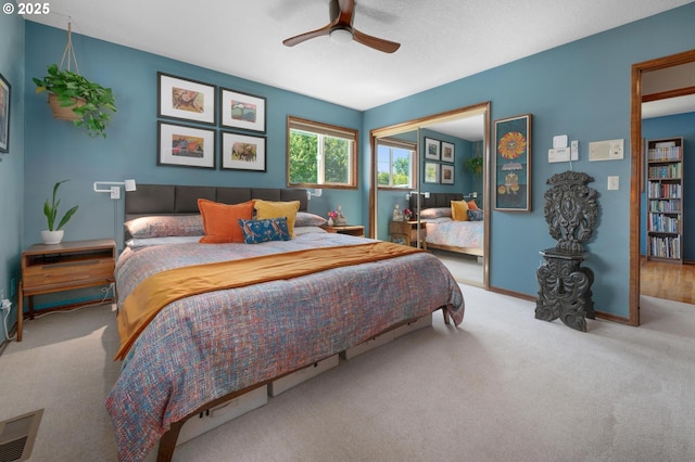 3511 NE Holman St, Portland, OR 97211 - bedroom featuring carpet floors, a closet, and a ceiling fan