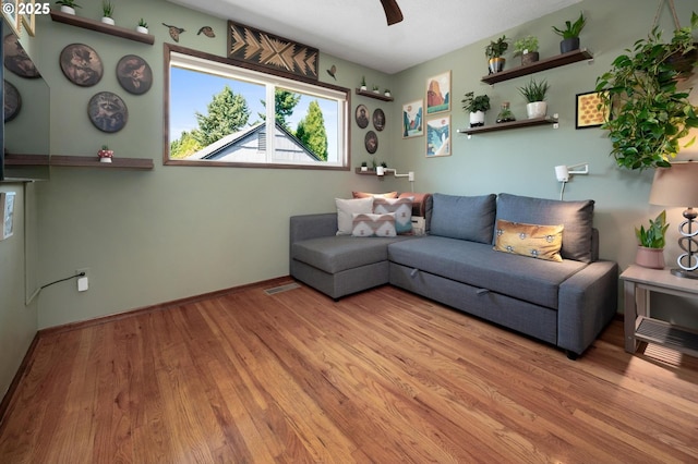 3511 NE Holman St, Portland, OR 97211 - living area featuring wood finished floors and a ceiling fan