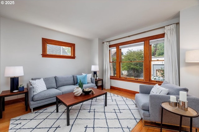 714 SE 35th Ave, Portland, OR 97214 - living area featuring light wood-style floors and baseboards