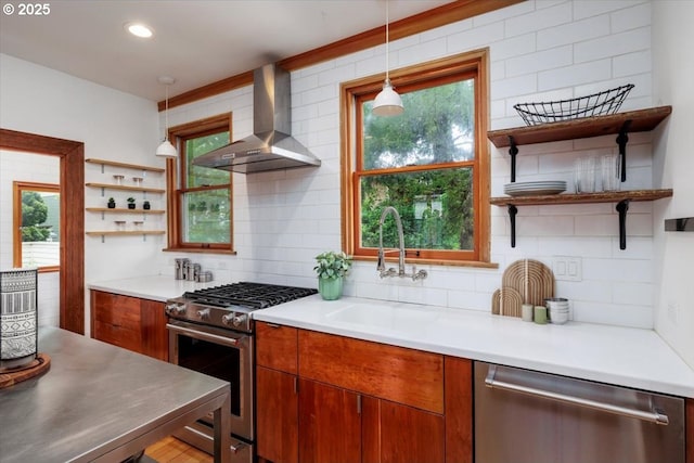 714 SE 35th Ave, Portland, OR 97214 - kitchen featuring appliances with stainless steel finishes, open shelves, wall chimney exhaust hood, and decorative backsplash