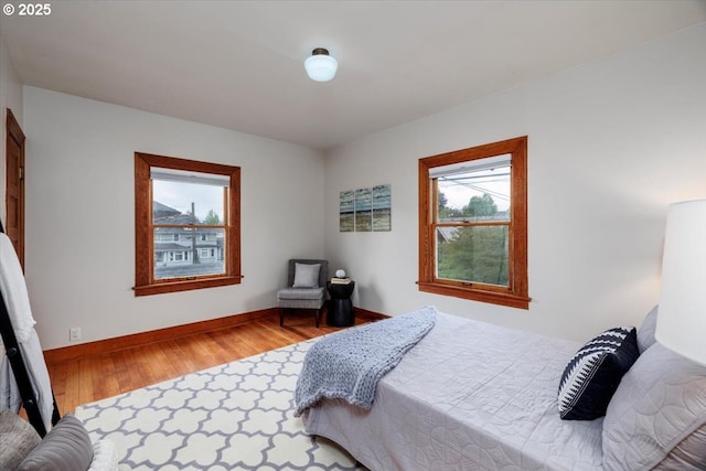 714 SE 35th Ave, Portland, OR 97214 - bedroom with hardwood / wood-style flooring and baseboards