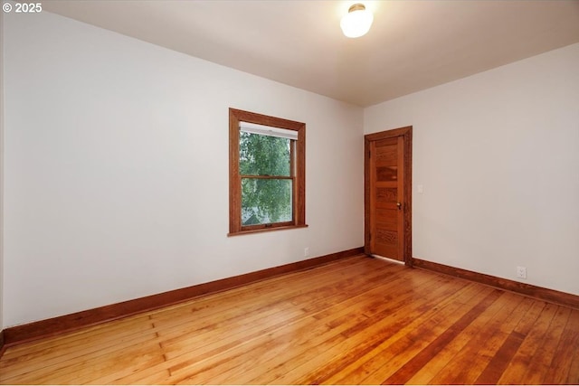 714 SE 35th Ave, Portland, OR 97214 - unfurnished room featuring baseboards and light wood-style flooring