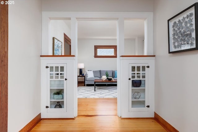 714 SE 35th Ave, Portland, OR 97214 - hallway featuring wood finished floors and baseboards