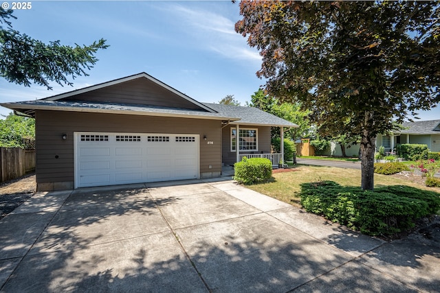 576 S 35th St, Springfield, OR 97478 - view of front of house with driveway, a porch, and an attached garage