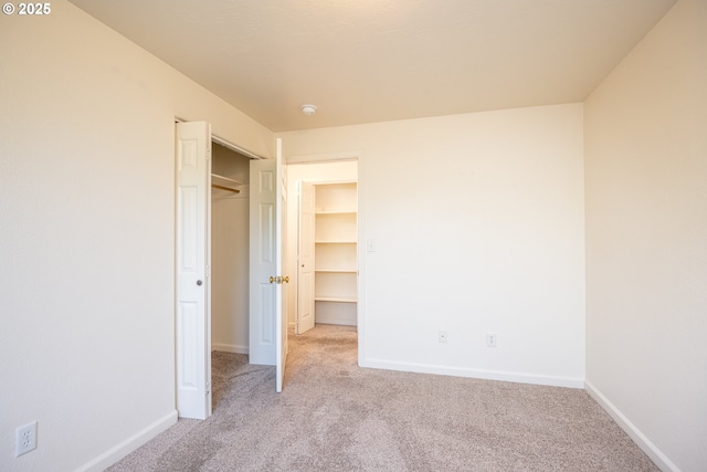 576 S 35th St, Springfield, OR 97478 - unfurnished bedroom featuring light colored carpet and a closet