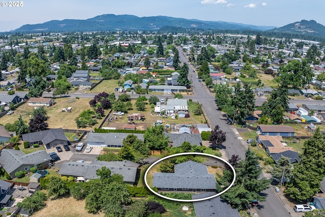 576 S 35th St, Springfield, OR 97478 - aerial perspective of suburban area with mountains