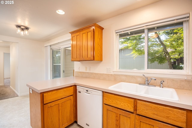 576 S 35th St, Springfield, OR 97478 - kitchen featuring dishwasher, light countertops, a peninsula, recessed lighting, and brown cabinetry