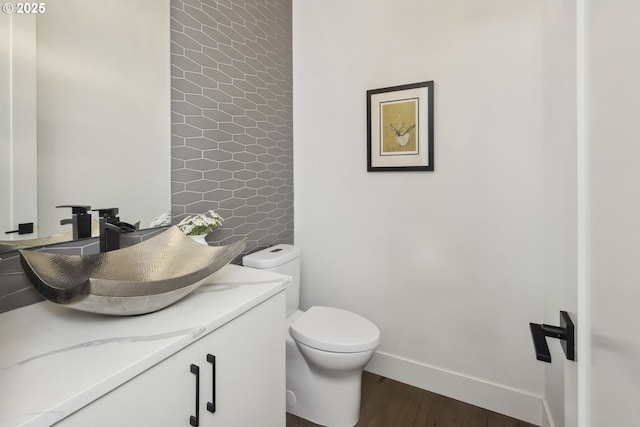 5674 NE 15th Ave, Portland, OR 97211 - bathroom with vanity and wood finished floors