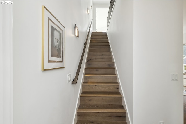 5674 NE 15th Ave, Portland, OR 97211 - staircase with baseboards and wood finished floors
