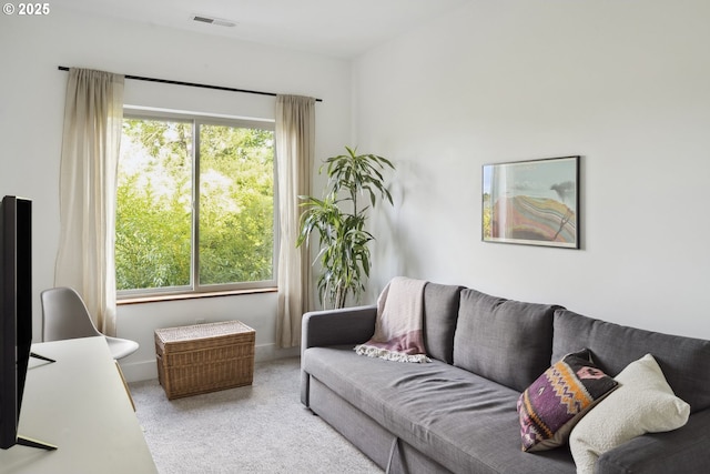 5674 NE 15th Ave, Portland, OR 97211 - living area featuring plenty of natural light and carpet