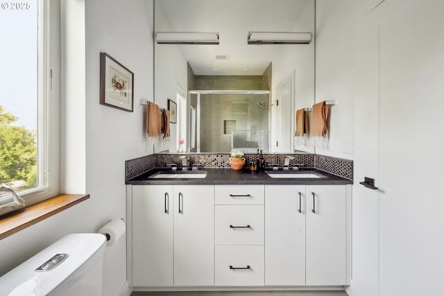 5674 NE 15th Ave, Portland, OR 97211 - full bathroom featuring a shower stall and double vanity