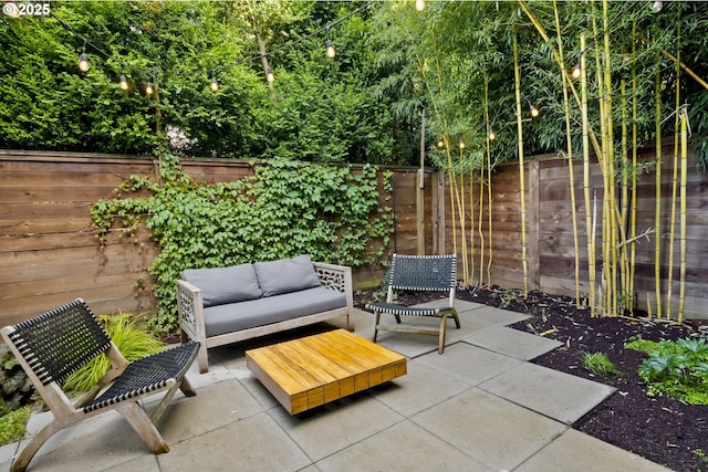 5674 NE 15th Ave, Portland, OR 97211 - fenced backyard with a patio area and an outdoor hangout area