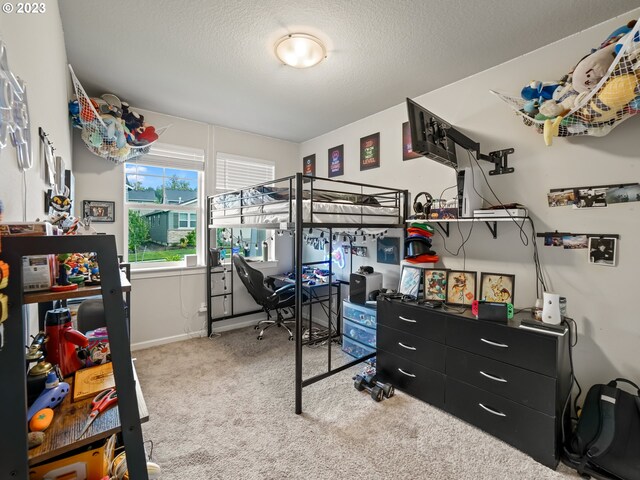 6212 N 87th Ave, Camas, WA 98607 - bedroom with carpet flooring, a textured ceiling, baseboards, and an office area