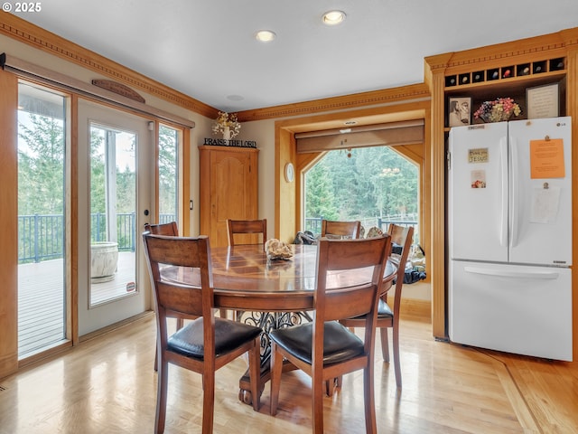7145 SE Amity Dayton Hwy, Amity, OR 97101 - dining area featuring healthy amount of natural light, recessed lighting, light wood-style floors, and crown molding