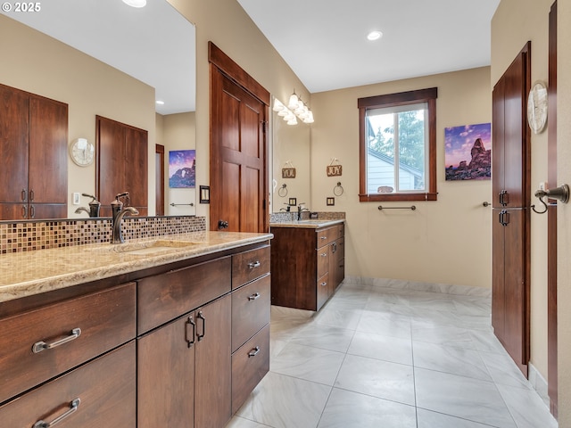 7145 SE Amity Dayton Hwy, Amity, OR 97101 - full bath featuring decorative backsplash, two vanities, recessed lighting, baseboards, and marble finish floors