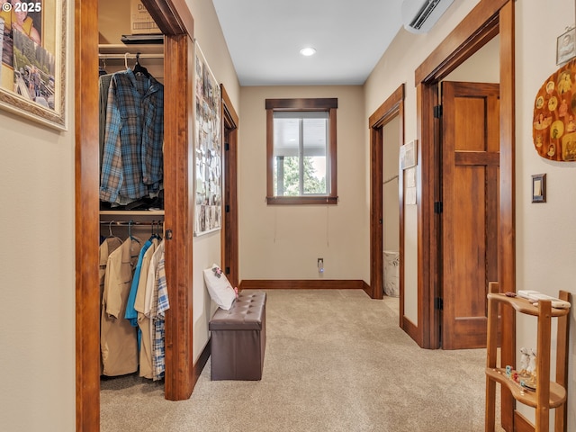 7145 SE Amity Dayton Hwy, Amity, OR 97101 - corridor with carpet floors, baseboards, an AC wall unit, and recessed lighting