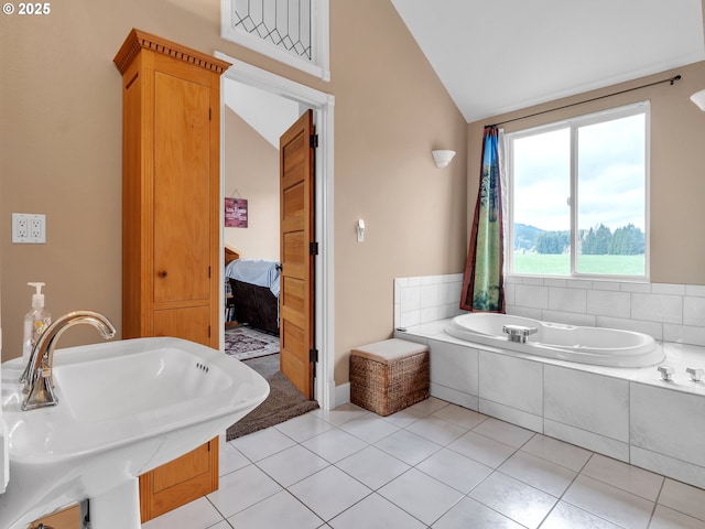 7145 SE Amity Dayton Hwy, Amity, OR 97101 - ensuite bathroom featuring a sink, lofted ceiling, a bath, and tile patterned floors