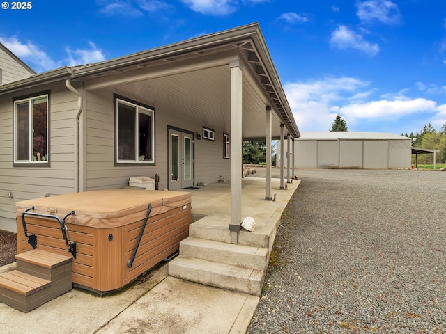 7145 SE Amity Dayton Hwy, Amity, OR 97101 - rear view of house featuring a hot tub