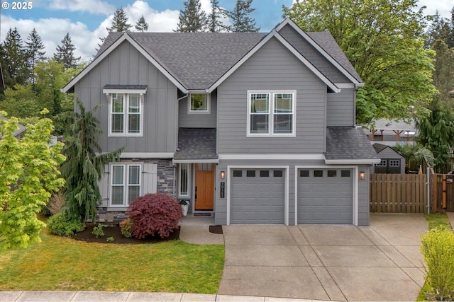 craftsman-style house featuring a garage, roof with shingles, fence, and driveway