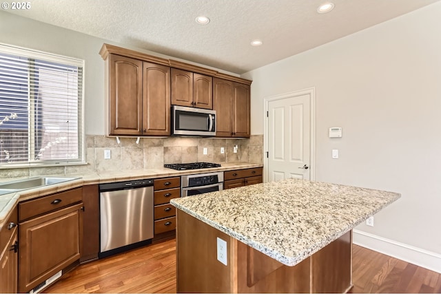 15610 SE Kingbird Dr, Happy Valley, OR 97015 - carpeted empty room featuring plenty of natural light and baseboards
