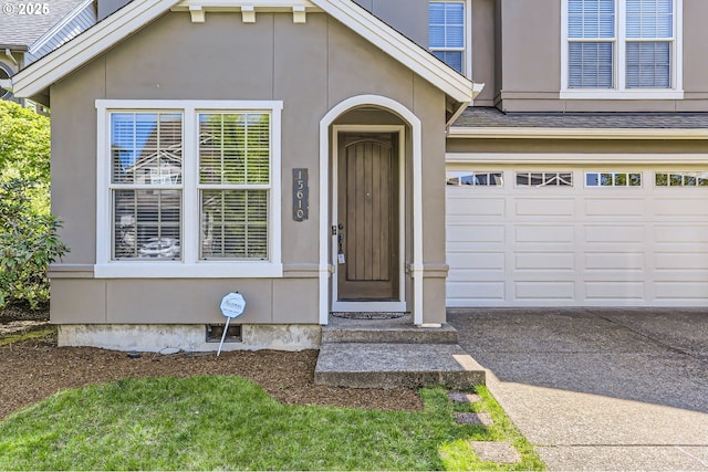 15610 SE Kingbird Dr, Happy Valley, OR 97015 - property entrance featuring driveway and stucco siding