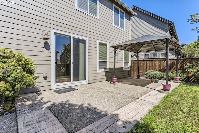 15610 SE Kingbird Dr, Happy Valley, OR 97015 - back of property with a gazebo, fence, and a patio