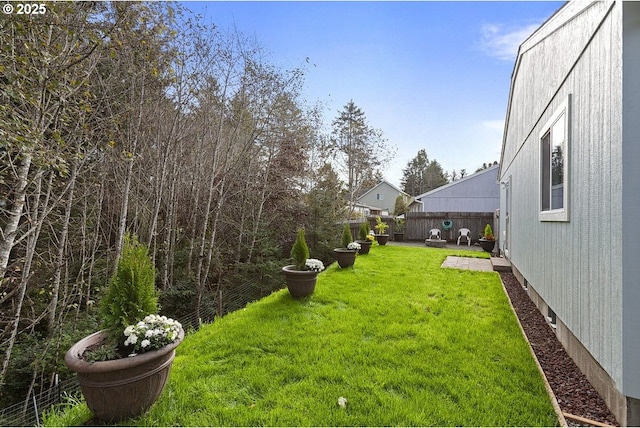 view of yard featuring a fenced backyard