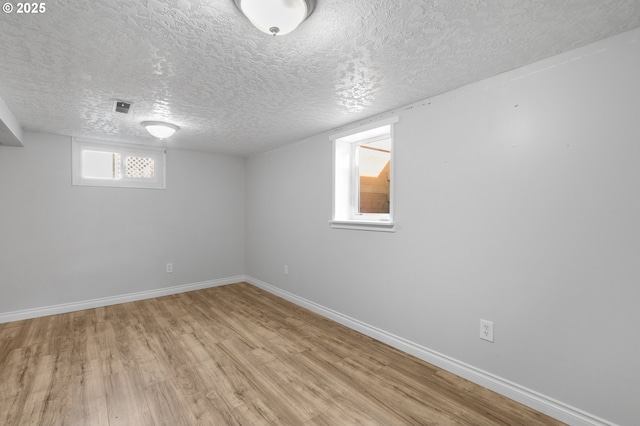 spare room with ceiling fan and hardwood / wood-style floors