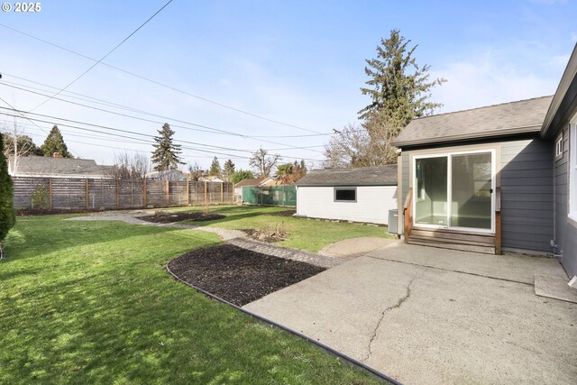 view of home's exterior featuring a carport, an outdoor structure, and a garage