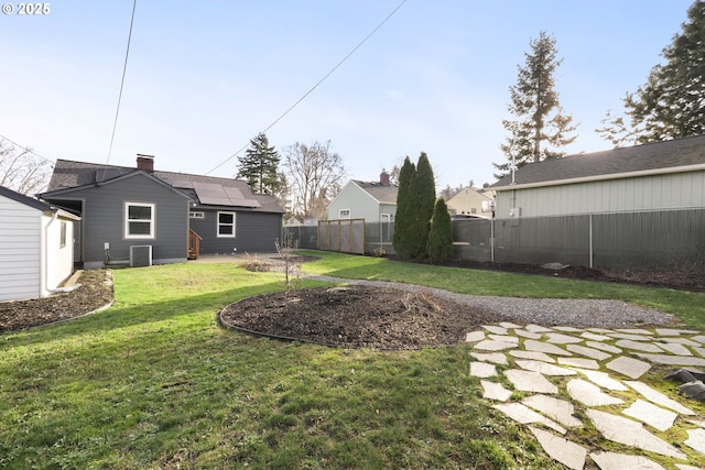 view of yard featuring central AC unit