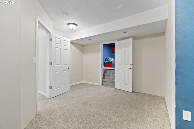 interior space with a textured ceiling