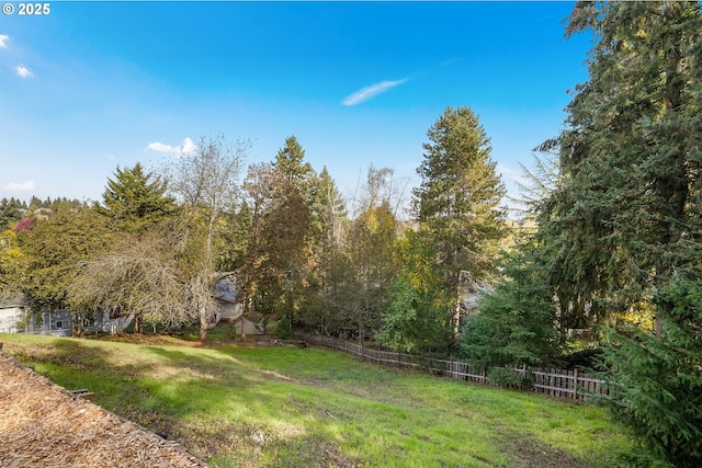 view of yard with fence