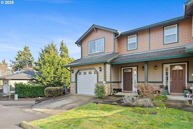 view of front facade with a garage and a front yard