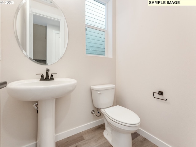 846 NW 178th Way, Ridgefield, WA 98642 - bathroom with wood finished floors and toilet