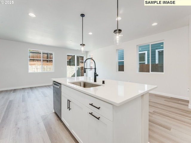 846 NW 178th Way, Ridgefield, WA 98642 - kitchen with dishwasher, light wood-style flooring, pendant lighting, recessed lighting, and light countertops