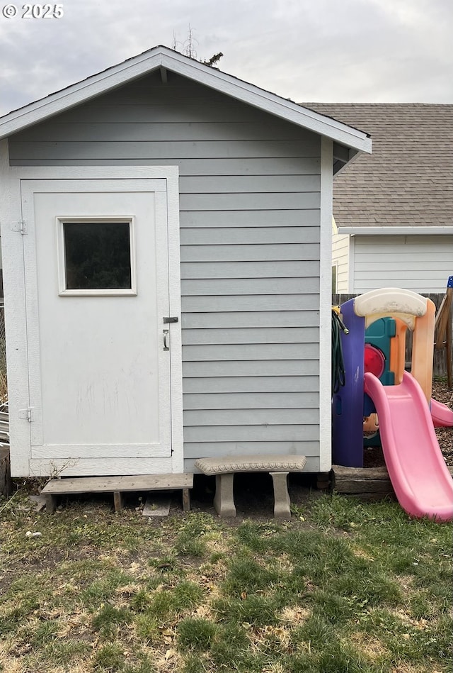 view of outbuilding featuring a playground