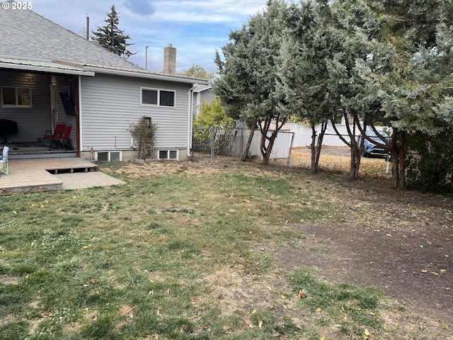 view of yard featuring a deck