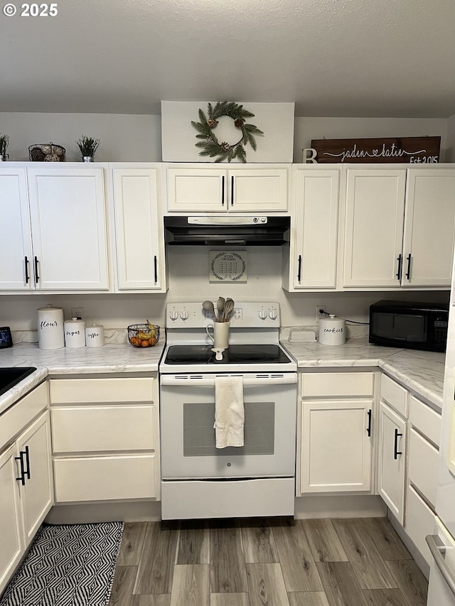 kitchen featuring white cabinetry, electric range, and wood-type flooring