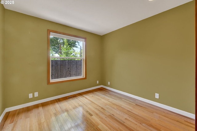 668 River Rd, Eugene, OR 97404 - unfurnished room featuring baseboards and light wood-type flooring