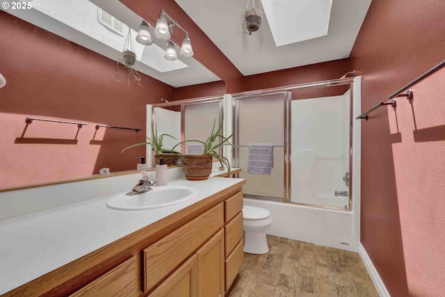 668 River Rd, Eugene, OR 97404 - bathroom with a skylight, vanity, and enclosed tub / shower combo